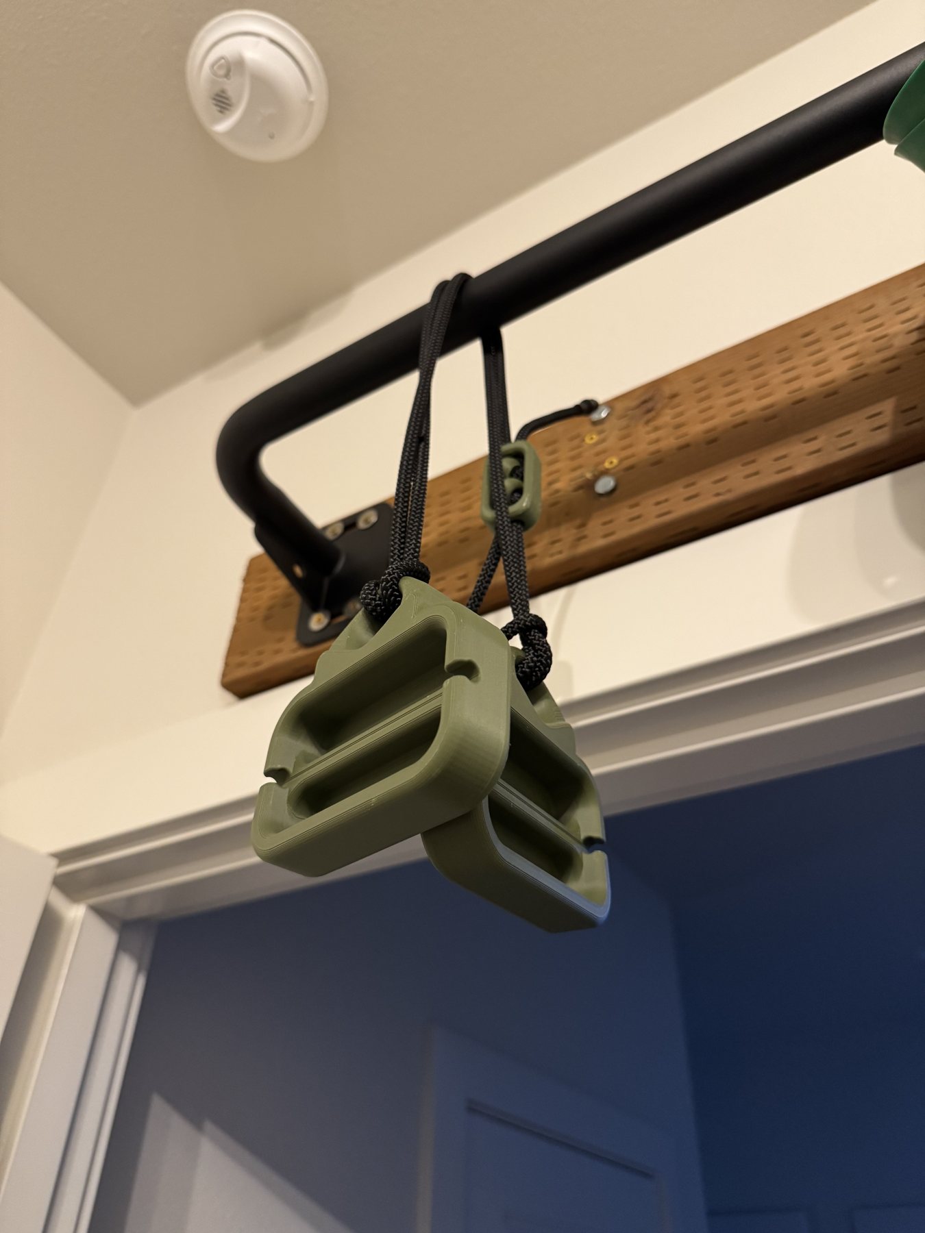 Hanging from the Cling handles